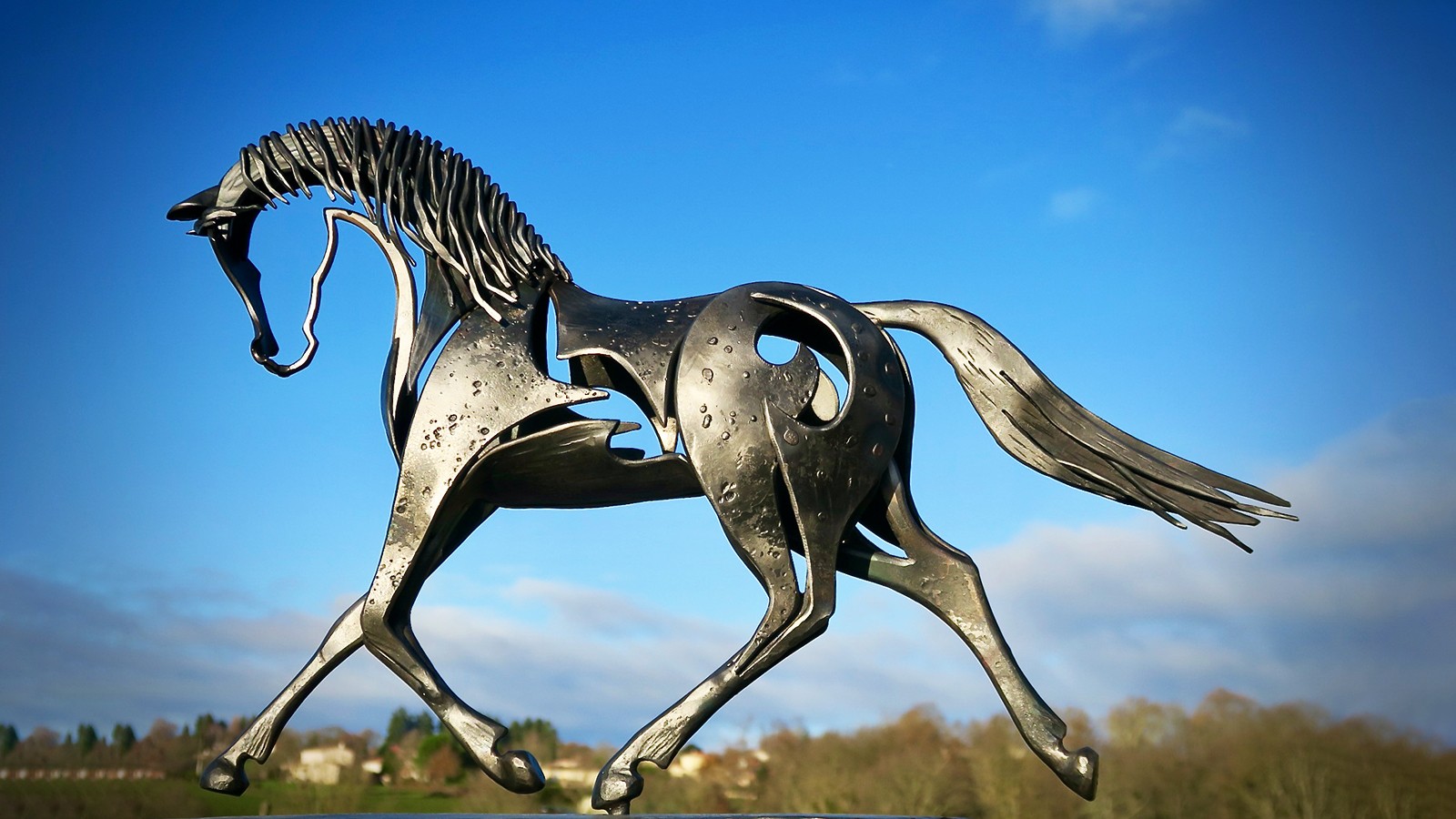不銹鋼公園鏤空馬雕塑,奔跑駿馬雕塑,戶外創(chuàng)意雕塑制作廠家